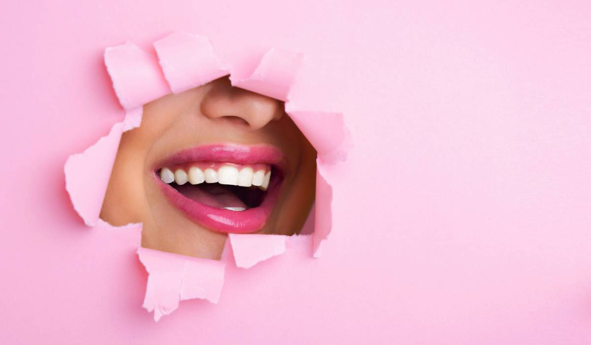 Stock image showing female model with smiling whiter teeth